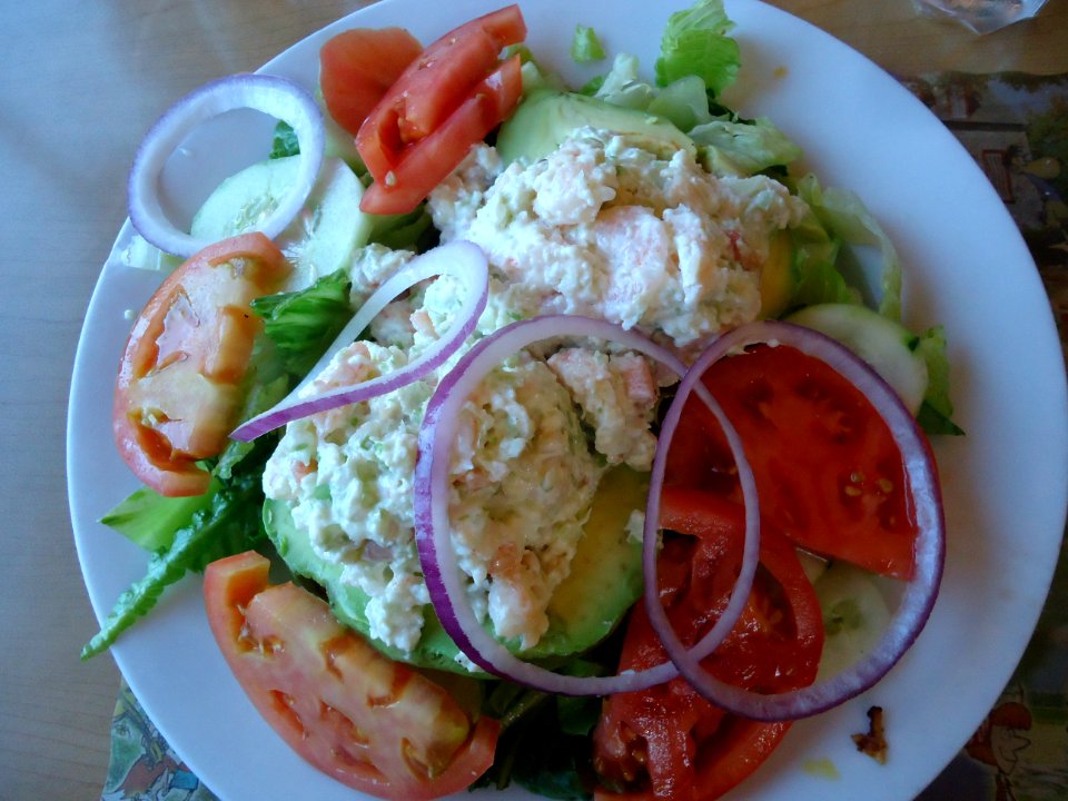 Shrimp salad with onions and tomatoes and lettuce