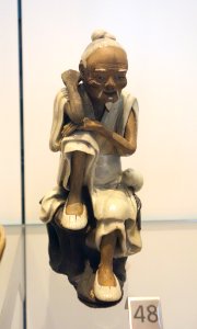 Shiwan figure, China, Qing dynasty, c. 1800-1900, stoneware with glazed detailing - Royal Ontario Museum - DSC03845