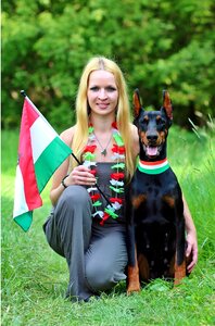 Doberman blonde woman love