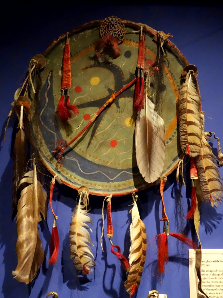 Shield with thunderbird and moon designs, Sioux, late 19th century, hide over wooden hoop with feathers, horse hair, porcupine quills, metal cones - Glenbow Museum - DSC00733