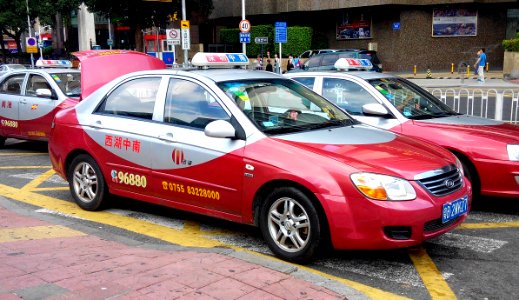 Shenzhen KIA red taxi 1