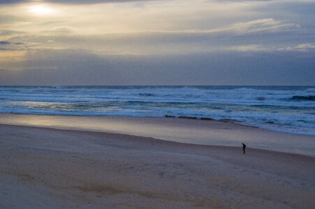 Sunrise storm beach photo