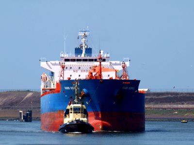Simson IMO 9054365 Callsign PHHN, MMSI 245285000 towing HANS SCHOLL - IMO 9247508 - Callsign A8EU8 at IJmuiden lock, Port of Amsterdam photo-1