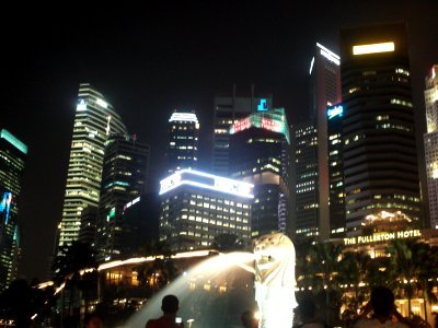 Singapore Merlion and skyscrapers in the background photo