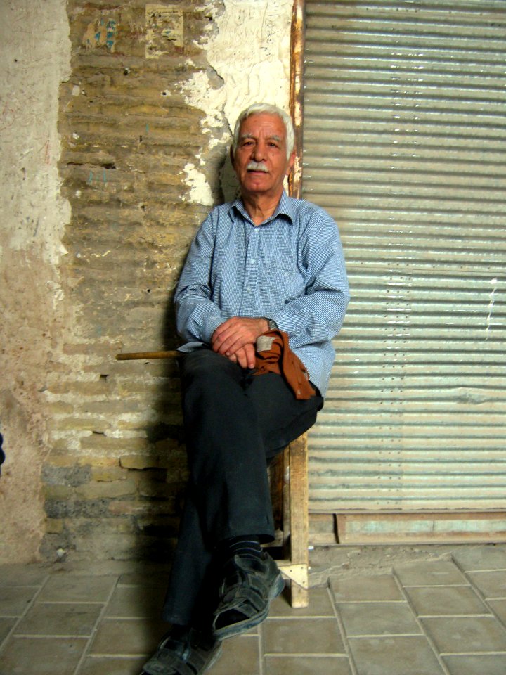 Sited Nishapuri oldman in Bazaar of Nishapur 1