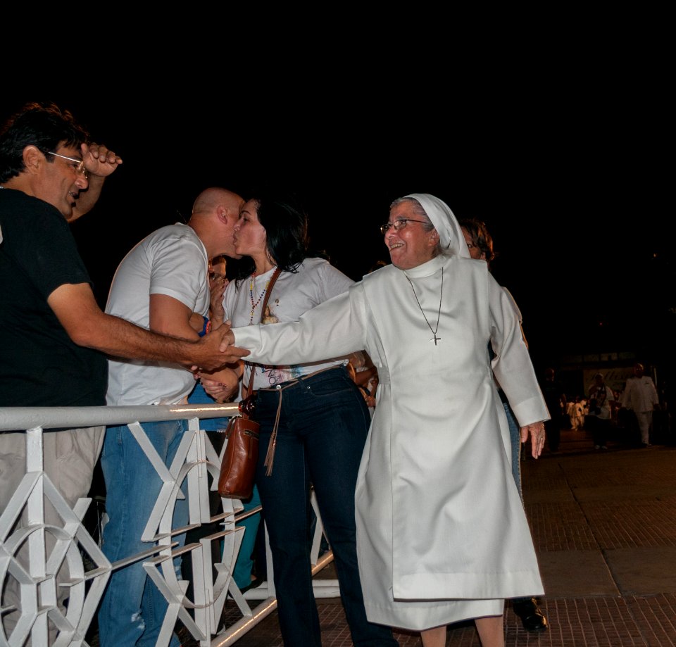 Sister waving to his people