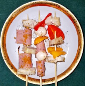 Skewers of chickem, ham, bell pepper, and pickled quails egg, with curry powder and black pepper - Massachusetts