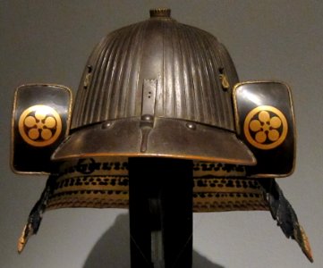 Sixty-two plate ridged helmet by Saotome Iesada with crest of Tako