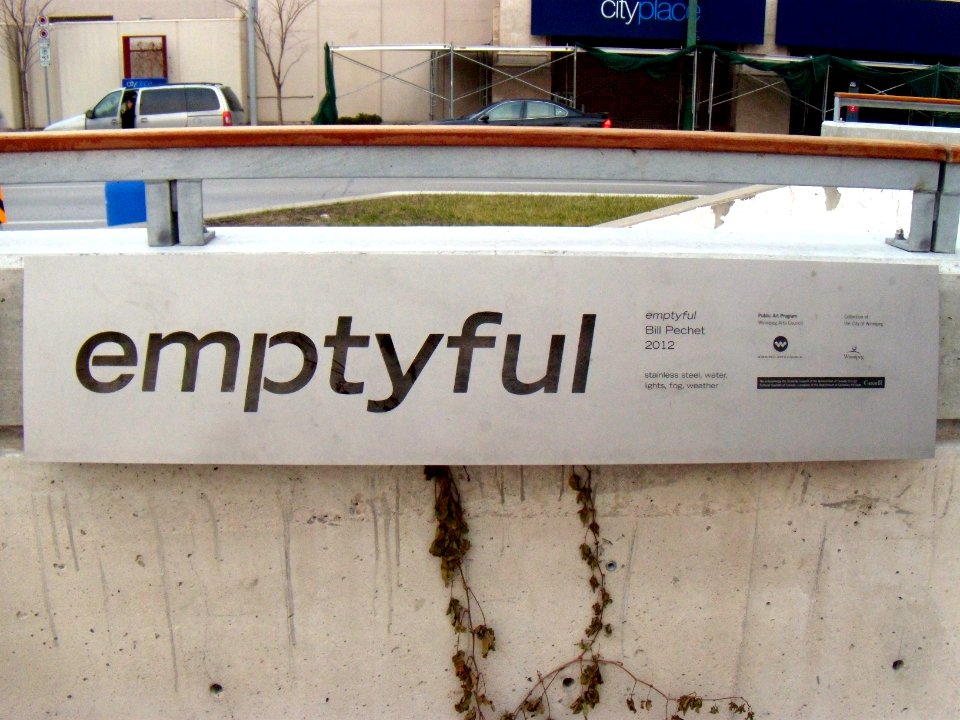 Signage for emptyful sculpture at Winnipeg's Millennium Library