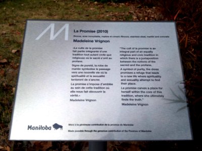 Signage for "La Promise" sculpture at Jardin de sculptures in Winnipeg, Manitoba