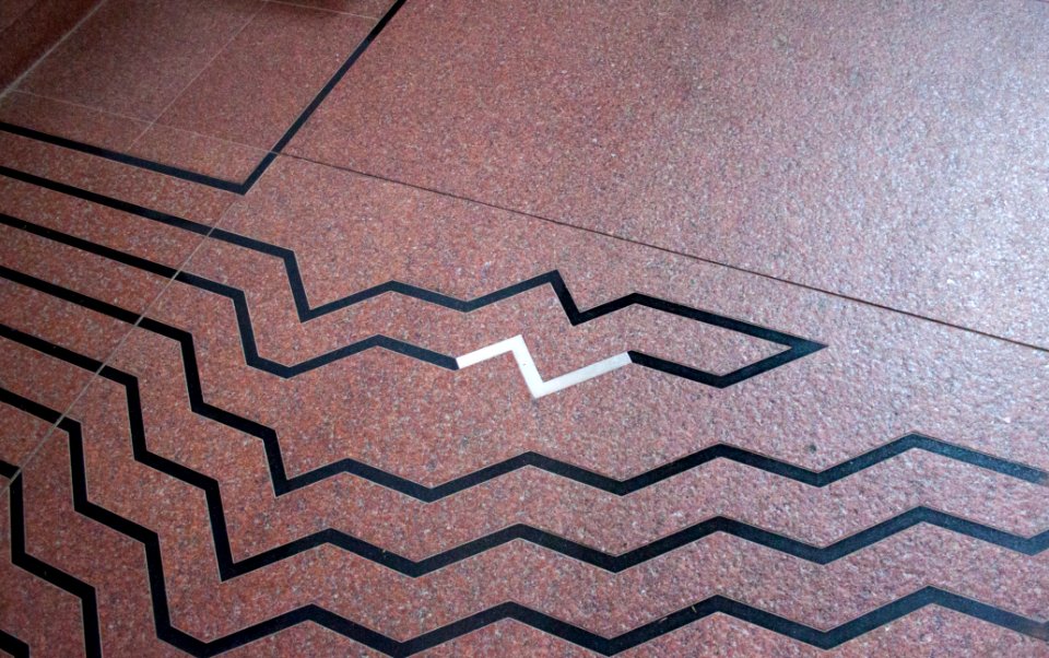 Silver sign in the floor of the church of Jelling, over the tomb of Gorm the Old