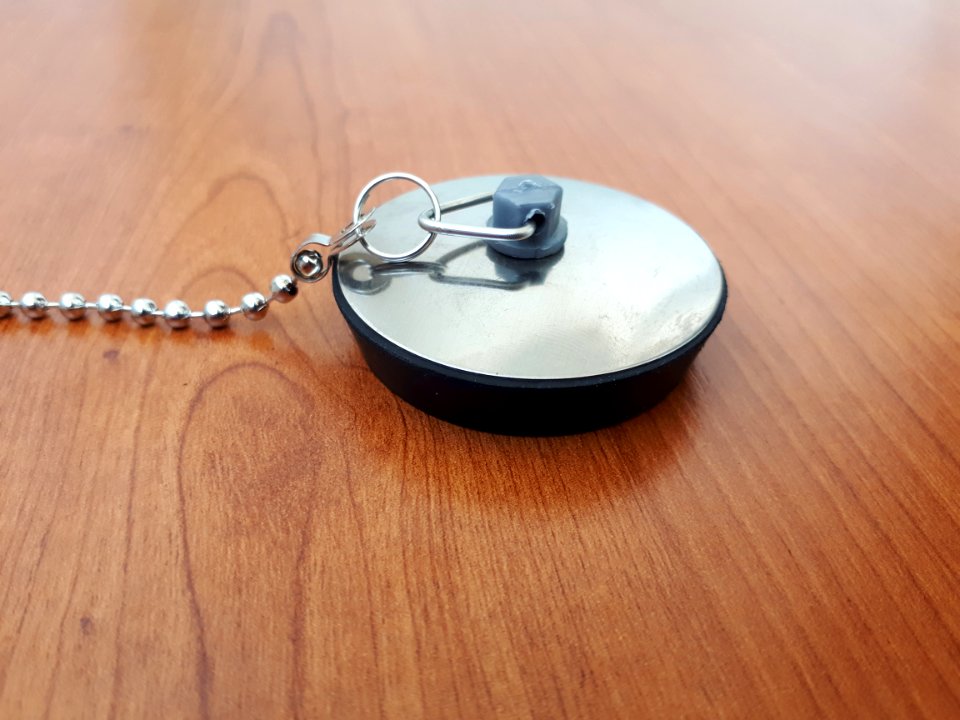 Sink plug with metallic top - C
