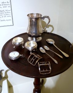 Silver by Samuel Bartlett 1752-1821, Concord, with watch by William Hopeton, London, 1815, on candle stand, probably Concord, early 1800s, mahogany, cherry - Concord Museum - Concord, MA - DSC05833
