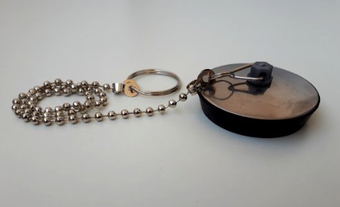 Sink plug with metallic top - B
