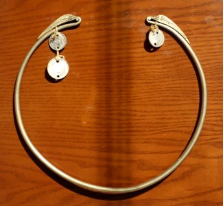 Silver torque of Vi Thi Panh, a gift from the groom's family, Sinh Mun, Yen Chau, Son La, 1954 - Vietnamese Women's Museum - Hanoi, Vietnam - DSC04383