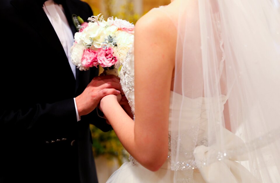 Wedding dress priest groom