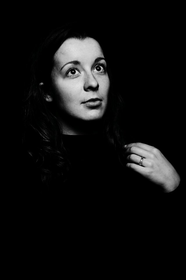 Black-and-white photo girl look up