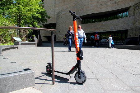 Spin scooter in front of National Museum of the American Indian, April 2019