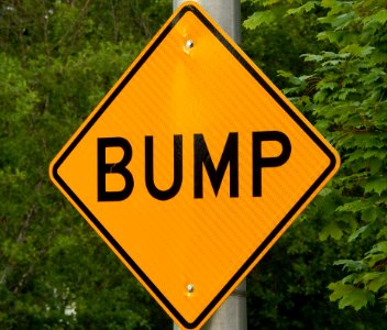 Speed bump warning sign