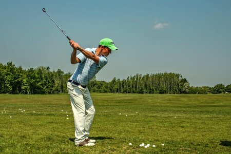 Golfers driving range exercise