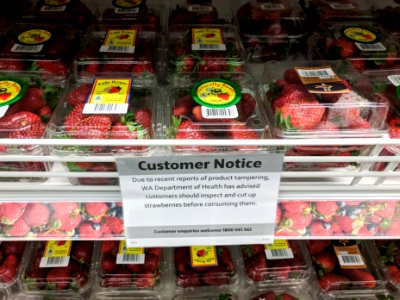 Strawberries on sale in Australia with tampering notice