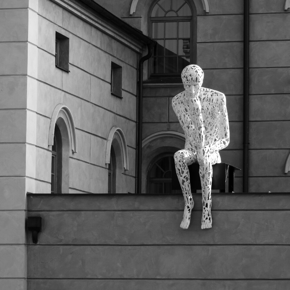 Sitting man czech budejovice reflection