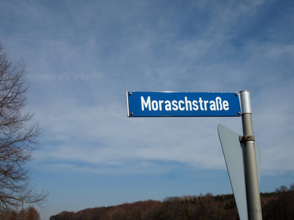 Straßenschild Moraschsstrasse