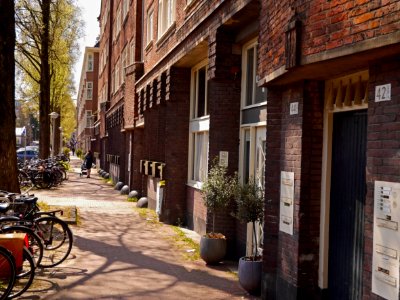 Streetview Amsterdam in sunlight and shadows - free photo, Fons Heijnsbroek