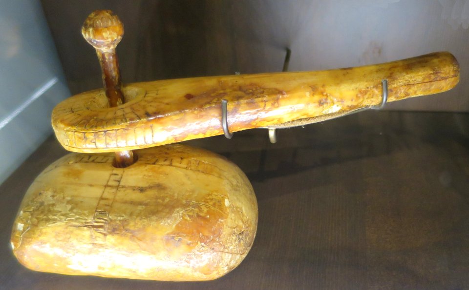 Stone ulu with bone handle, Alaska State Museum