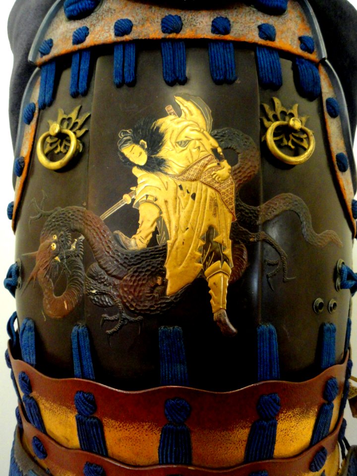 Suit of Armor, detail of samurai slaying a dragon, Japan, 1500-1899 - San Diego Museum of Man - DSC06899