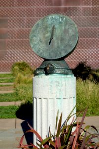 Sundial by M. Earl Cummings, honoring navigators Sir Francis Drake, Juan de Cabrillo, and Fortuo Ximines, 1907, bronze - De Young Museum, Golden Gate Park - DSC00136