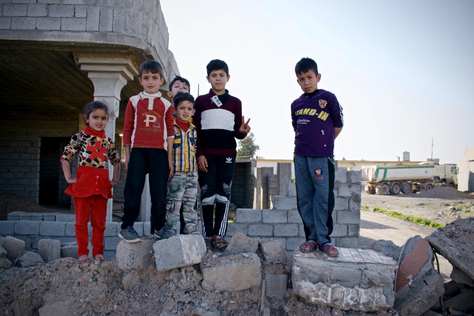 Survivors in the rubble of destruction by the Islamic State in the village Wardik 13