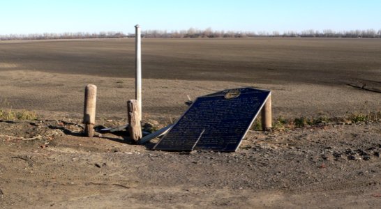 Survey monument RH00-062 fallen historic marker