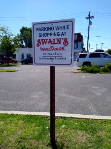 Swain's Parking sign