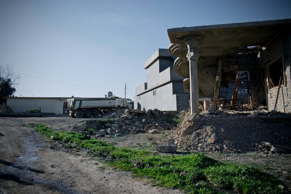 Survivors in the rubble of destruction by the Islamic State in the village Wardik 10