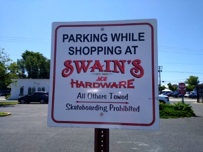 Swain's Parking sign A