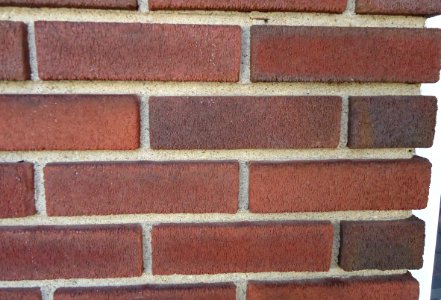 Surfaces brick wall with mortar closeup view photo