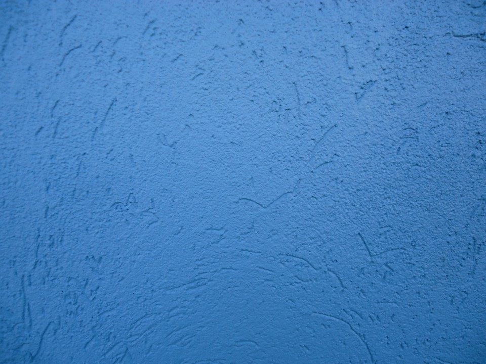 Surfaces wall textured painted blue