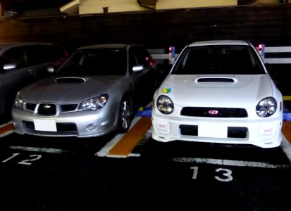 Subaru IMPREZA 5door (GDF) & IMPREZA WRX STi (GDA) at night front