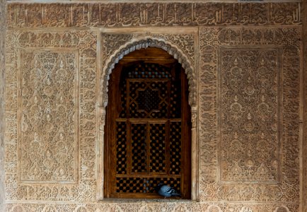 Stuccos, window and pigeon Cuarto dorado Alhambra, Granada, Andalusia, Spain photo