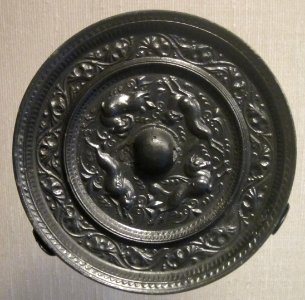 Sui dynasty bronze mirror with four racing animals design, HAA