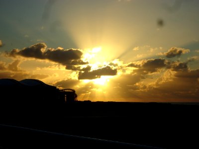 Sun breaking through clouds over Atlantic Ocean in Wildwood, New Jersey