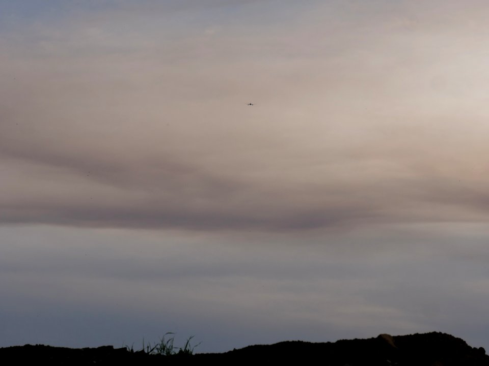 Sun behind clouds and forest fire smoke in Berlin-Spandau 2019-06-03 11