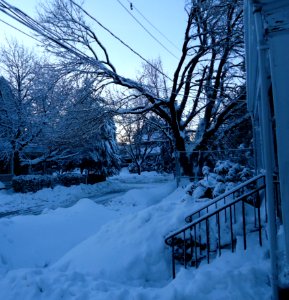 Summit New Jersey after several snowfalls walkways shoveled porch view in February