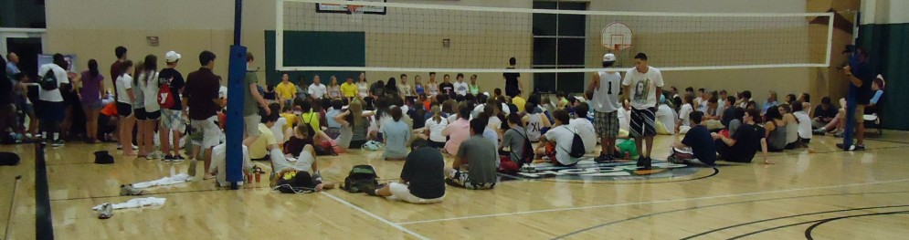 Summit high school students post-graduation hypnotism event in gym
