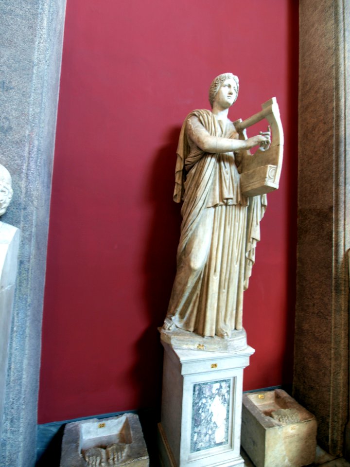 Statue of a female playing a harp in the vatican museum pic2