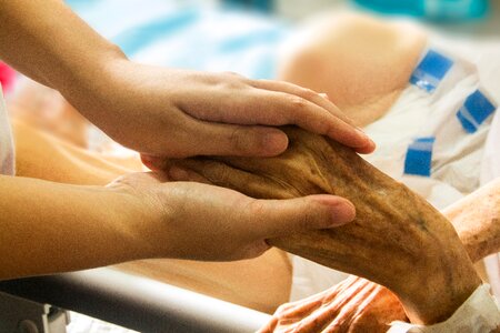 Nursing caring holding hand photo