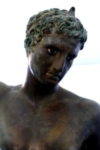 Statue of naked youth, replica of original in Athens National Museum, view 2, 4th century BC, found in the sea at Marathon, bronze - Martin von Wagner Museum - Würzburg, Germany - DSC05612