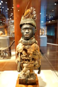 Standing power figure, Democratic Republic of Congo, Kongo people, 19th century, wood, feathers, glass, metal, fiber - De Young Museum - DSC01044