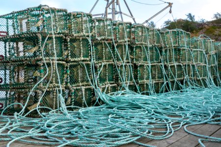 Stacks of lobster traps in Norra Grundsund 4 photo